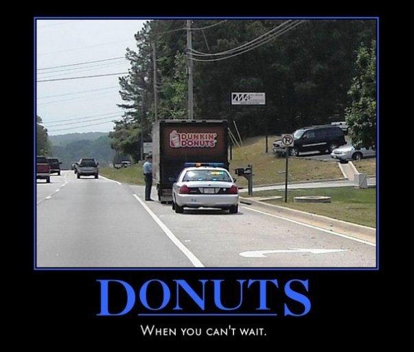 Demotivational poster of a Dunkin Donuts truck pulled over by a police car