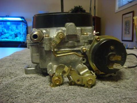 1975 Chevrolet Corvette - Close-up of a Holley carburetor, a key engine component for many classic cars.