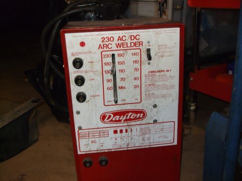1996 Jeep Grand Cherokee - A Dayton 230 AC/DC Arc Welder is shown with its control panel amperage settings and operational switches.