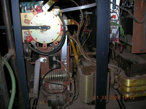1997 Ford F-250 - Close-up of the internal workings of a welding machine, revealing its electrical components and wiring.