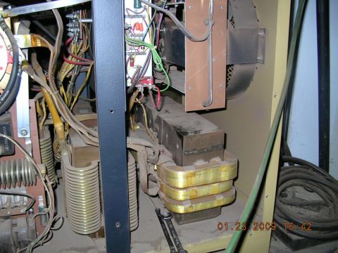 1997 Ford F-250 - Close-up view of the internal components of a welding machine, including transformers and wiring.