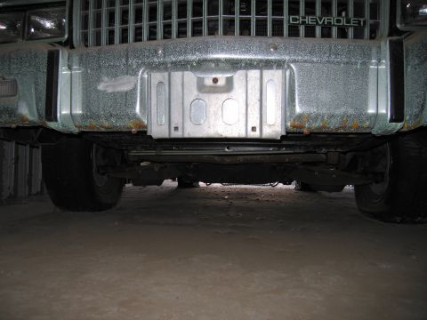 1991 Ford LTD Crown Victoria - Photo of the underside front bumper and skid plate of a Chevrolet inside a storage container.