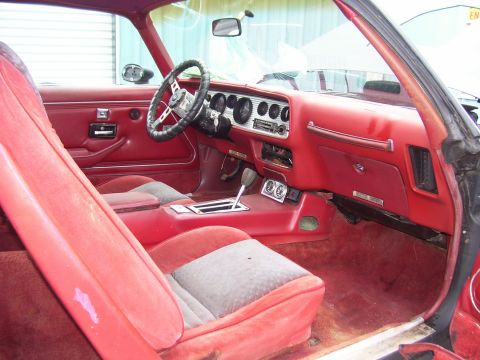 1978 Pontiac Trans Am - Interior view of a 1978 Pontiac Trans Am, showing the dashboard, seats, and center console.