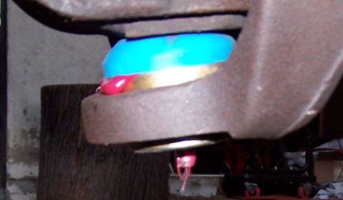 1990 Ford Bronco - Close-up of a ball joint assembly, showing new polyurethane and grease.