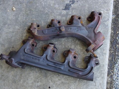 1987 Ford Bronco - 351w exhaust manifolds. good shape (minus the bolts on the end, easy fix) still has most of the factory glaze on them! had around 70,000 mi…