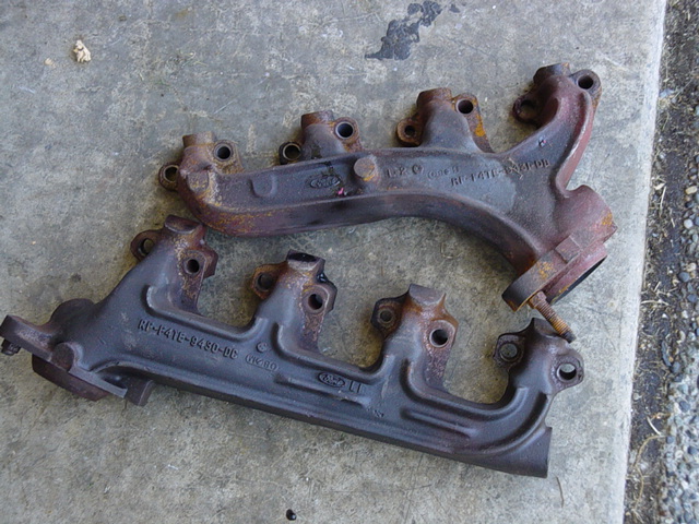 351w exhaust manifolds. good shape (minus the bolts on the end, easy fix) still has most of the factory glaze on them! had around 70,000 miles on them. asking 100 for both OBO