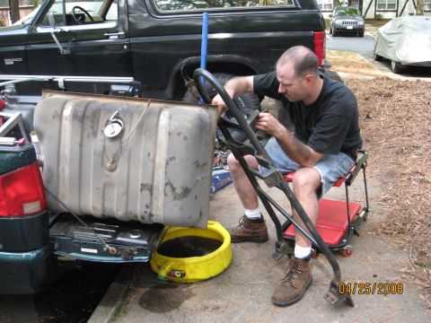 1986 Ford Bronco - Trying to fix the leaking Gas tank with a high strength epoxy. Didnt work so i bought a new tank, problem solved. Also that day the wifey c…