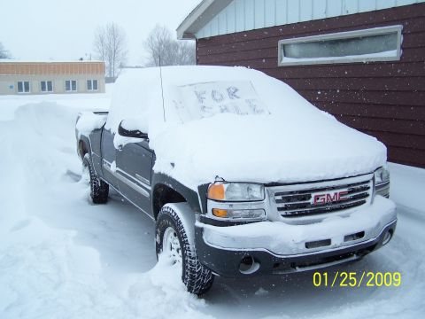 1900 Acura CL - GMC pickup truck buried in snow, with 'FOR SALE' visible on the windshield. Photo dated January 25, 2009.