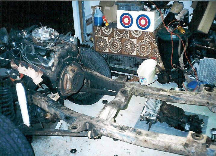 We think that's a '7? T-bird 351, but we don't know where the transmission (3.03?) came from.  Neither will be reused.