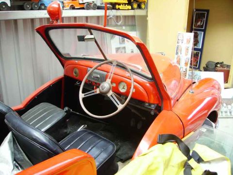 1969 MINI Cooper - Interior view of a classic 1969 MINI Cooper, highlighting its dashboard and seating.