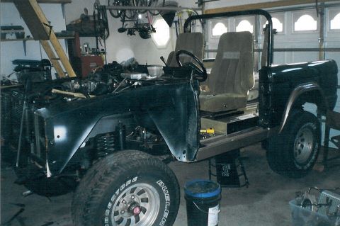 1975 Ford Bronco - We added shoulder belts to the roll bar. They came from the same '86 EB Bronco as the seats, and we had nuts welded into the bar to use the…