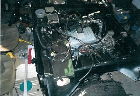 1975 Ford Bronco - Even the Crown Vic plenum comes close to the hood, and I had to flip the IAC and move a throttle body heater line to fit the IAC around the…