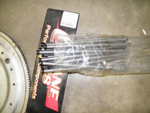 1968 Mercury Cougar - Engine pushrods and flywheel shown with Performance Components packaging.