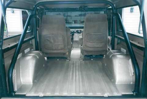 1975 Ford Bronco - The Rhino-lining goes from the floor to the ceiling, and up the firewall & tailgate. We found a great little seat that will fold flat like…