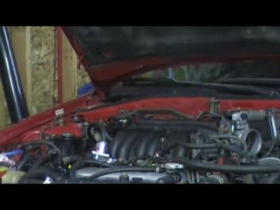 1990 Ford Probe - 2004 Ranger composite intake manifold installed, 60mm mustang TB modified to fit. Still have some work to do, the steam is a small coolant…
