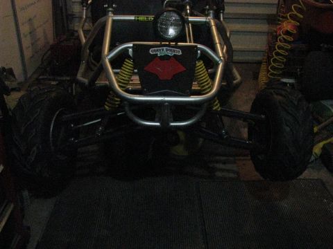 2006 Ford F1 - This go-kart features a "Grave Digger" decal on its front.