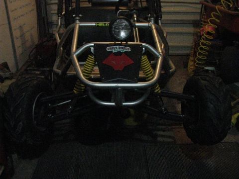 2006 Ford F1 - This go-kart has a prominent roll cage and a 'Grave Digger' decal on the front.