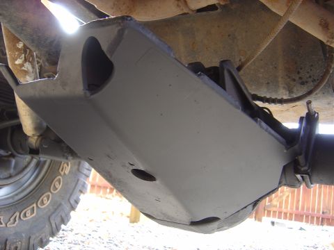 1996 Ford F-250 - Close-up view of the underbody skid plate on a 1996 Ford F-250.