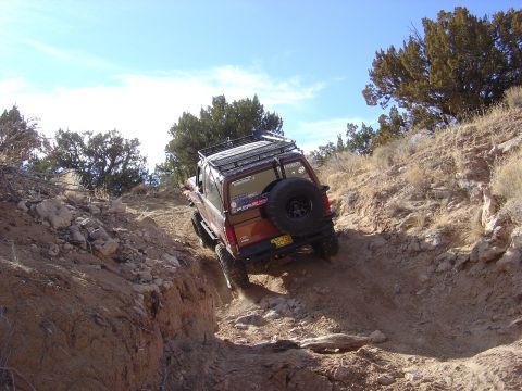 1996 Ford F-250 - This 1996 Ford F-250 navigates a challenging off-road course on a sunny day.