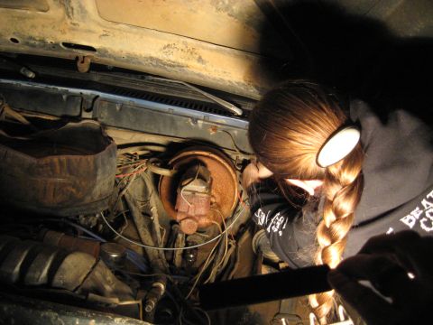 1978 Ford Bronco - Working on the engine bay of an older vehicle, focusing on the brake master cylinder area.