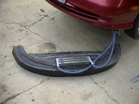 1997 Ford Taurus - Additional coolant cooler added to the pre oil cooler coolant line.