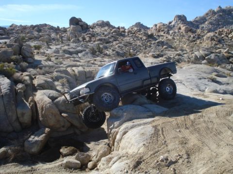 1997 Ford Ranger - Modified 1997 Ford Ranger navigating a challenging rocky terrain.