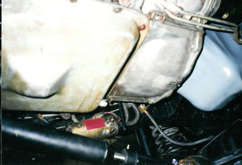 1975 Ford Bronco - 4WD trans pan & vent tube, hi-pressure fuel pump, extended brake line, painted oil pan with new gasket.