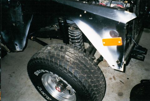 1975 Ford Bronco - New inner fender with undercoating. Nice tires, huh?