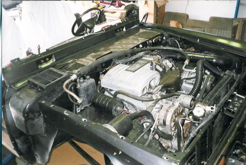 1975 Ford Bronco - Emissions equipment is working, and the space on that wheelwell can be used for future components, including A/C.