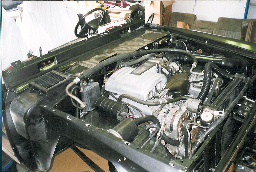 Emissions equipment is working, and the space on that wheelwell can be used for future components, including A/C.