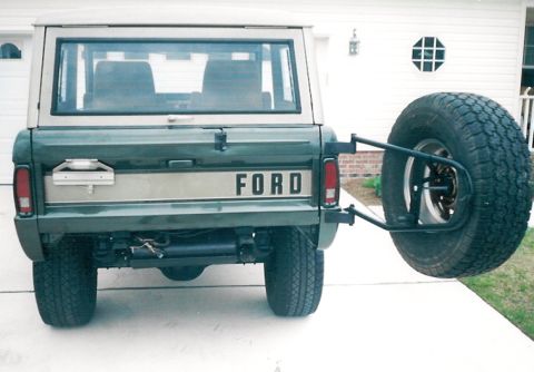1975 Ford Bronco - The colors are 2000 Eddie Bauer Expedition Estate Green & Light Prarie Tan. Note the aftermarket defrost grid in the rear window.