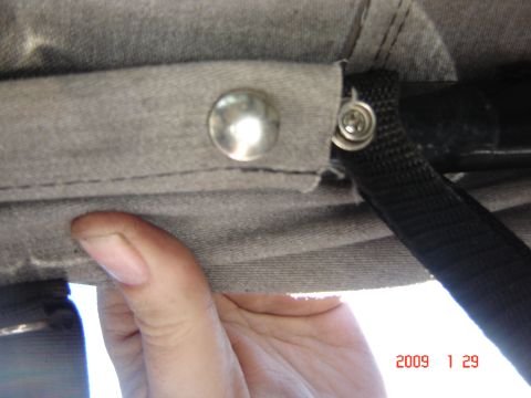 1993 Ford Bronco - A hand is shown adjusting the soft top attachment on a vehicle, with a date stamp indicating January 29, 2009.