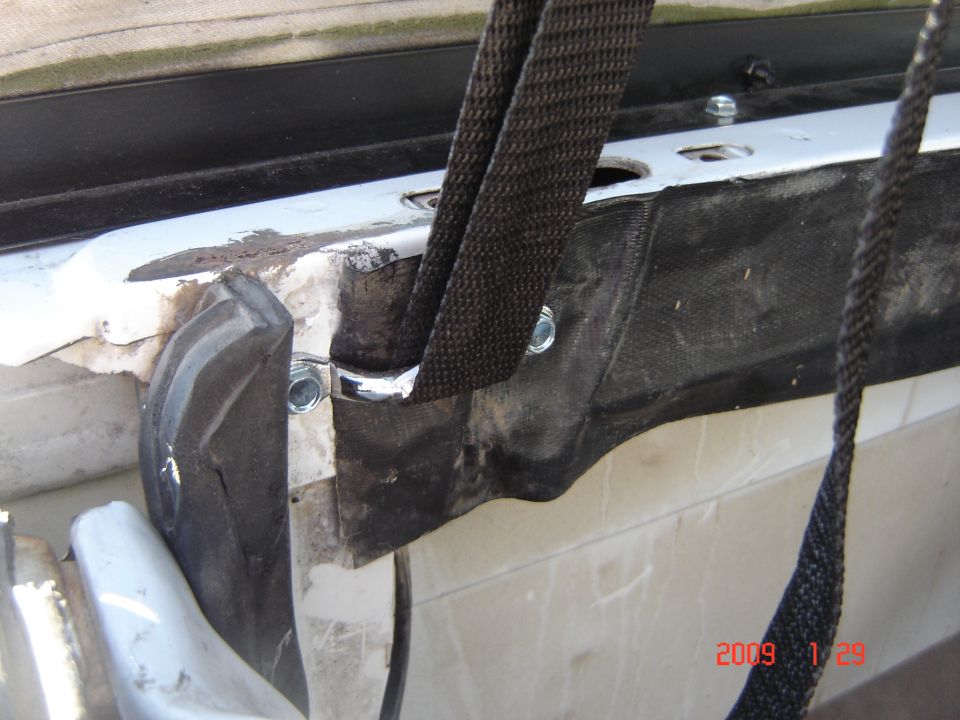 Soft top mounting hardware with black straps and bolts