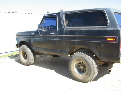 1979 Ford Bronco - This black Ford Bronco appears to be from the late 1970s, likely a 1978 model, based on its body style.