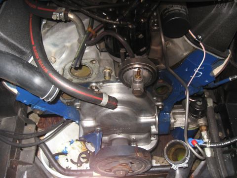 1968 Shelby GT500 - Engine bay details with various hoses and mechanical components visible, including a blue painted bracket.