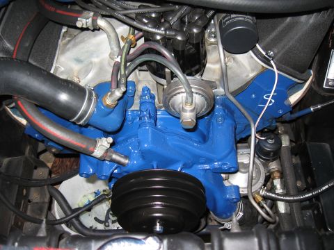 1968 Shelby GT500 - Engine bay details with blue painted parts and various hoses and wires visible.