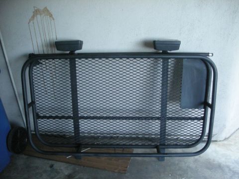 1991 Ford Bronco - This is a cargo rack, possibly for an SUV, with two lights attached.