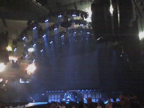2004 Land Rover Land Rover - A concert stage is set up with numerous lights and speakers, ready for a performance.