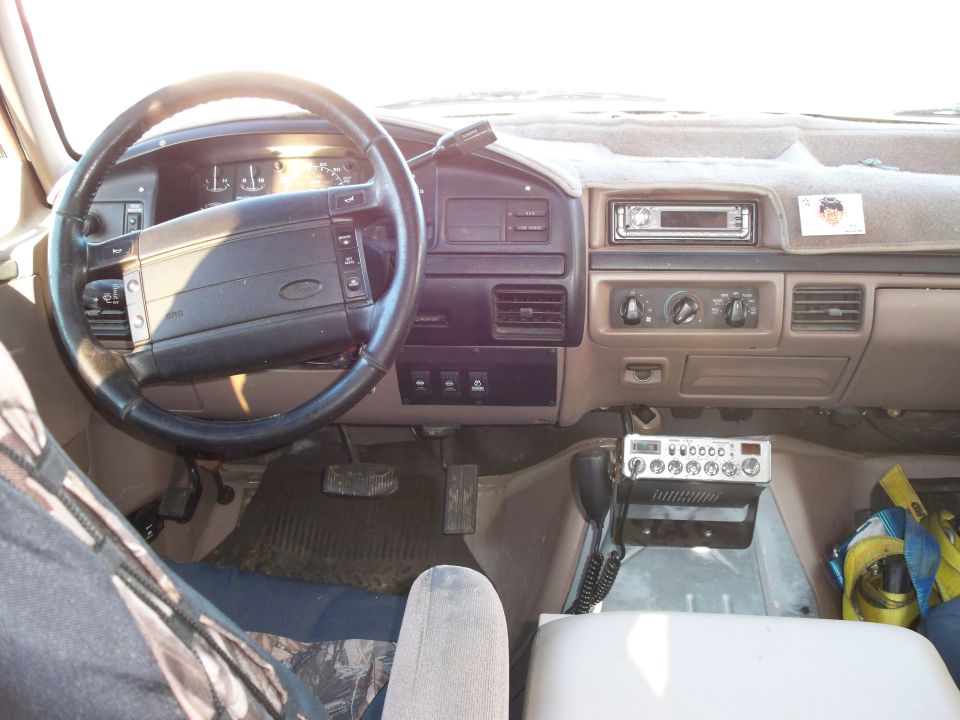 1996 Ford Bronco interior dashboard and steering wheel with CB radio