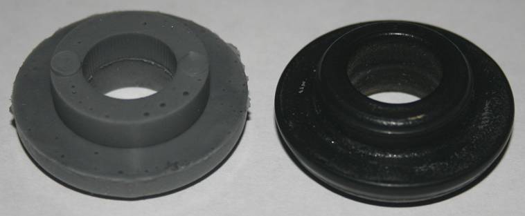 Gray and black rubber bushings