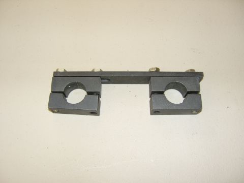2007 Ford Mustang - Photograph of a clamp-style service fixture tool, not a document.