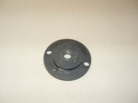2007 Ford Mustang - Photograph of a flanged adapter plate service tool, not a document.