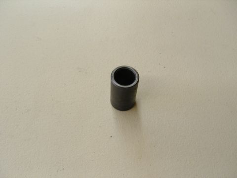 2007 Ford Mustang - Photograph of a cylindrical metal spacer/bushing, not a technical document.