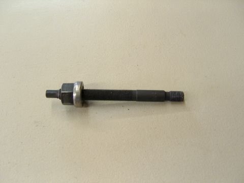 2007 Ford Mustang - Photograph of a threaded jack/puller screw with hex head and washer, not a technical document.