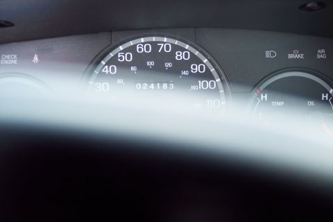 2001 Ford Crown Victoria - Dashboard view of a 2001 Ford Crown Victoria, displaying the odometer and various warning lights.