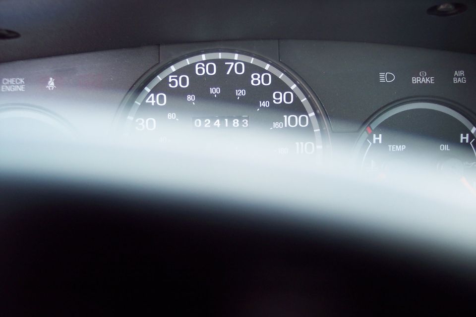 2001 Ford Crown Victoria dashboard showing speedometer, odometer reading 024183, and temp/oil gauges