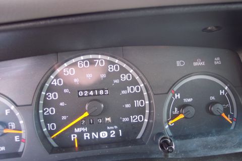 2001 Ford Crown Victoria - The odometer shows 24,183 miles. The speedometer is marked up to 120 MPH.