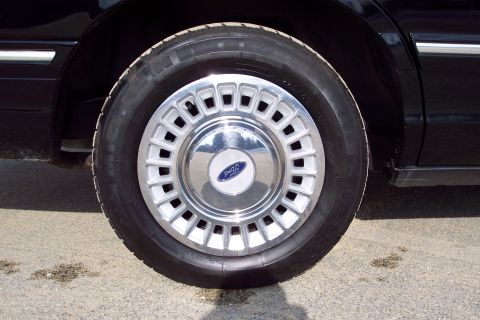 2001 Ford Crown Victoria - The Ford logo is visible on the hubcap of this vehicle's wheel.
