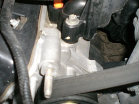 2000 Mercury Grand Marquis - Close-up view of an engine component, possibly related to an intake leak.