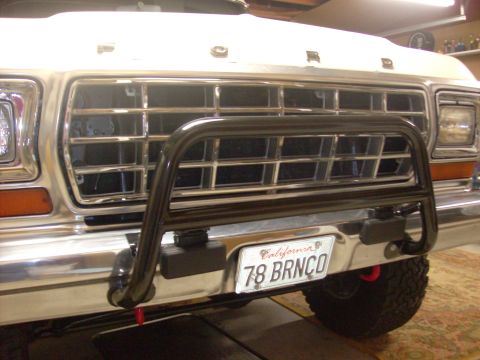 1978 Ford Bronco - Front view of a 1978 Ford Bronco, a bull bar and a custom license plate that reads '78 BRNCO'.